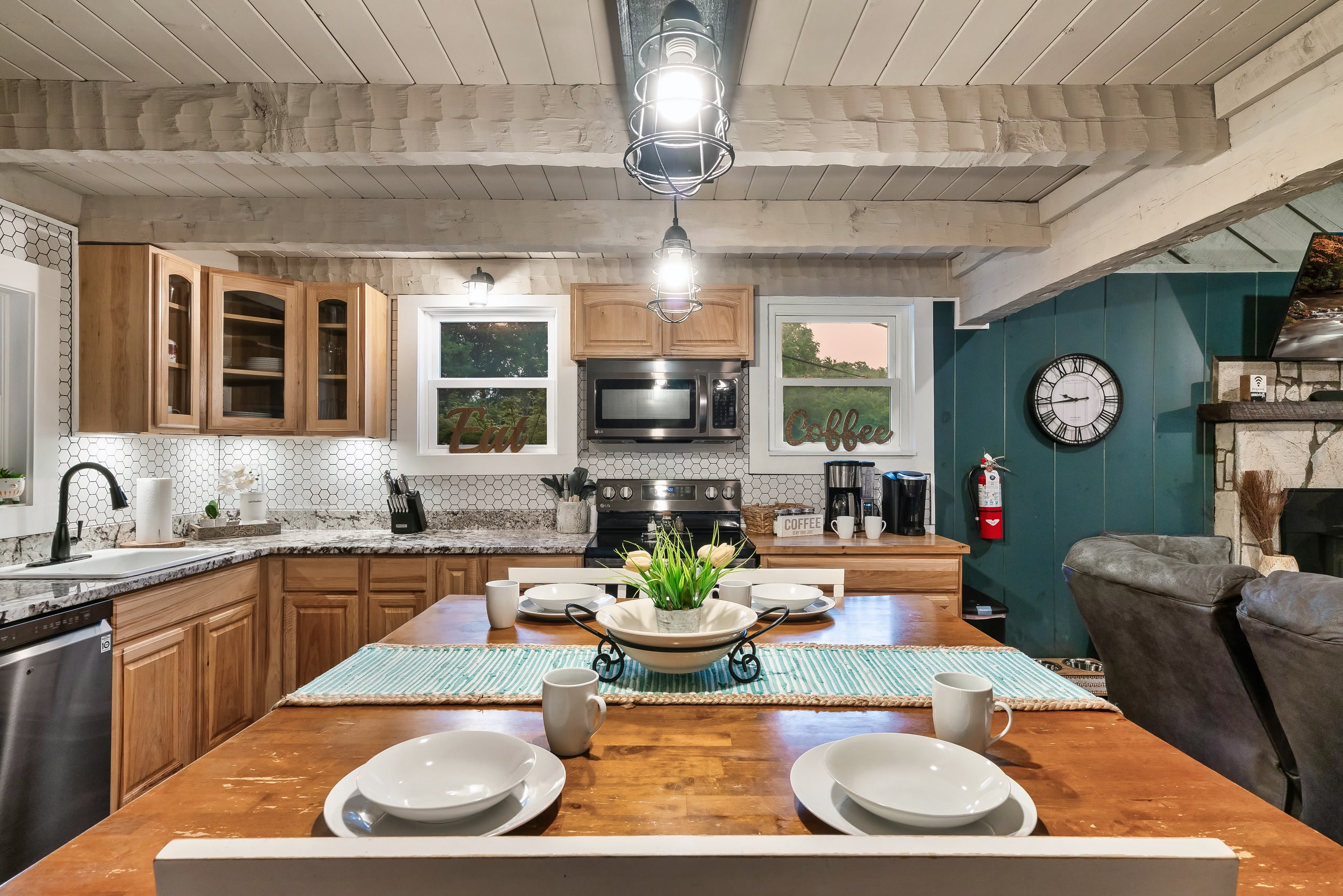 Hillside Haven kitchen with hexagonal backsplash and granite counters in Tennessee