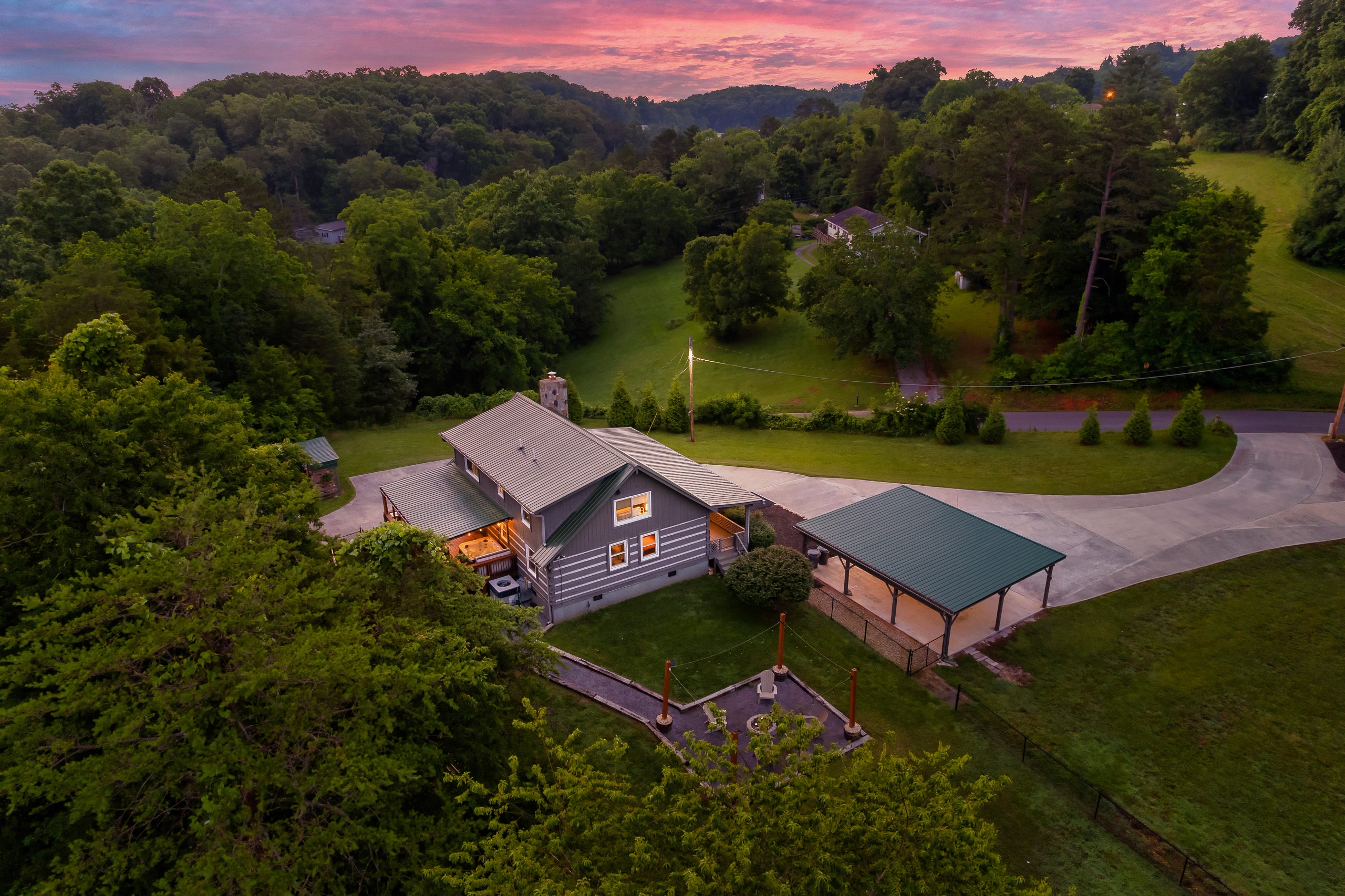 Hillside Haven aerial view of forested property at dusk in Tennessee Smoky Mountains