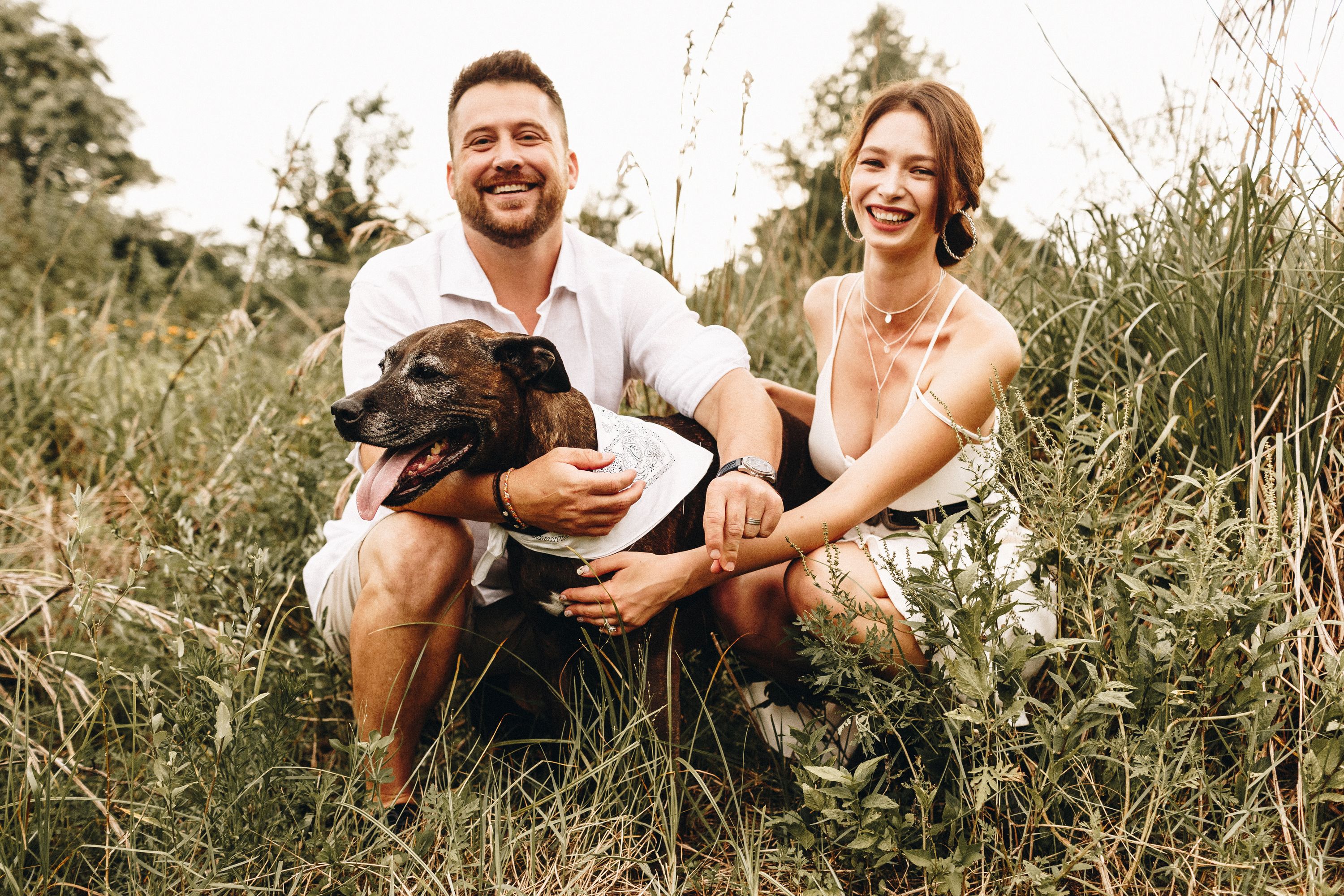 Your hosts with their dog in a field