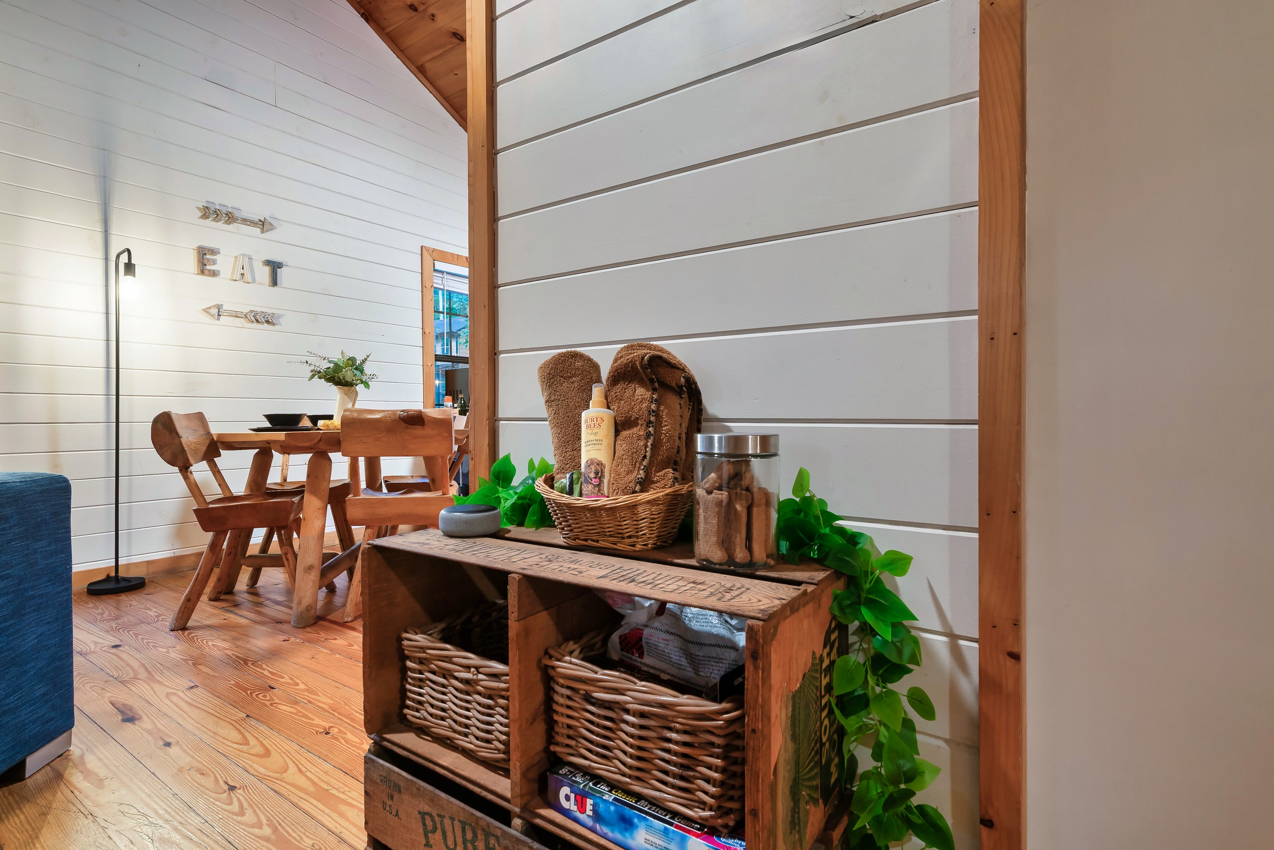 Open concept dining area at Smoky Creek Hideaway with rustic storage console