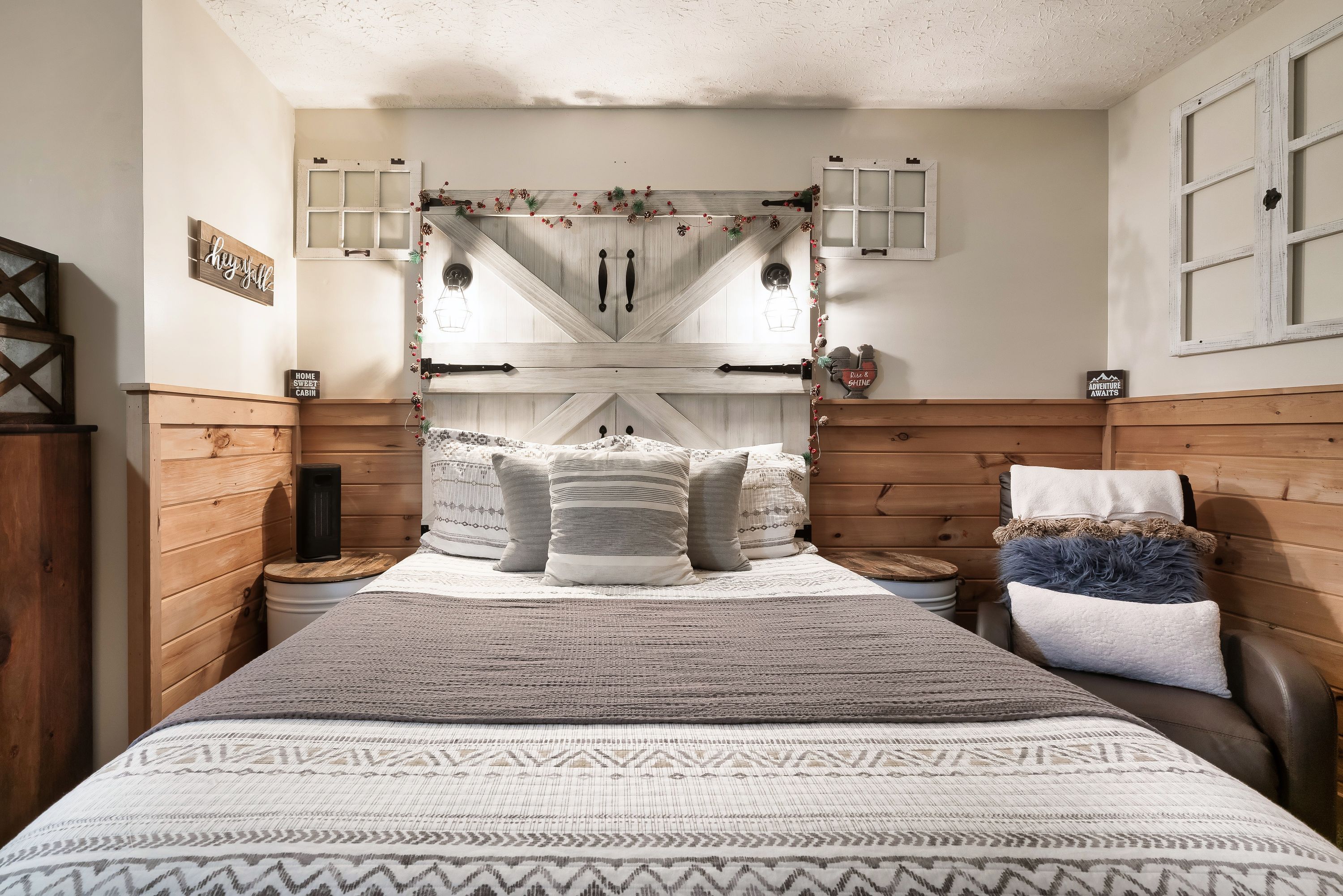 Rustic Rooster bedroom with barn door headboard and farmhouse decor